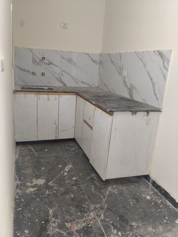 Kitchen in 2 BHK Apartment at DMD Hometech Awas Yojna, Sector 73 – for Sale
