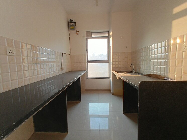 Kitchen, kalpataru-immensa-d 2 Bedroom 632 Sq.Ft. Apartment In Kolshet Road Thane 9724999