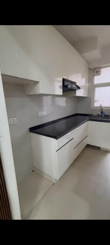 Kitchen in 2 BHK Apartment at Shree Vardhman Green Court, Sector 90 – for Rent