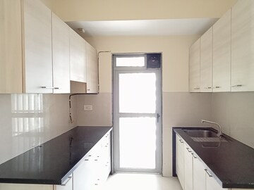 Kitchen in 2 BHK Apartment at Rustomjee Urbania Azziano, Thane West – for Rent