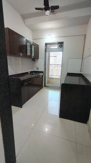 Kitchen in 3 BHK Apartment at Rustomjee Urbania Azziano, Thane West – for Rent