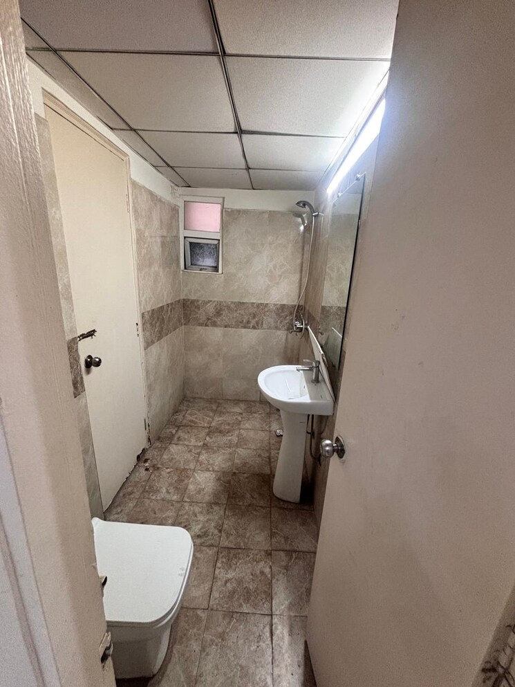 Bathroom, gaurs-siddhartham 2 Bedroom 945 Sq.Ft. Apartment In Siddharth Vihar Ghaziabad 9725156