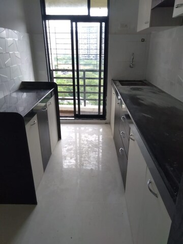 Kitchen in 1 RK Apartment at RNA NG Rock, Mira Road – for Sale