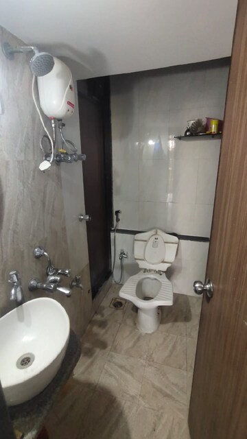 Bathroom in 1 BHK Apartment at Mahavir Kalpavruksha, Ghodbunder Road – for Rent