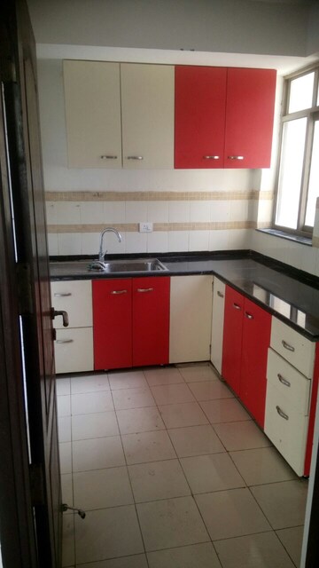 Kitchen in 2 BHK Apartment at Unitech Uniworld Gardens 2, Sector 47 – for Rent