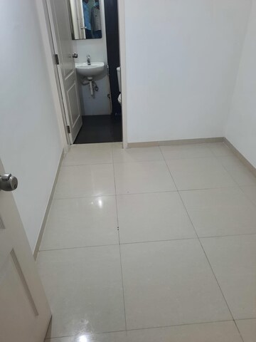 Bathroom in 2 BHK Apartment at Kolte Patil Langston, Kharadi – for Rent