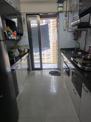 Kitchen in 2.5 BHK Apartment at Acme Ozone, Manpada – for Rent