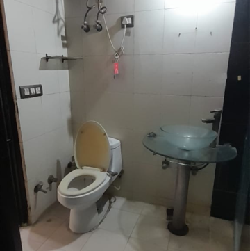 Bathroom in 3 BHK Apartment at Oxirich Avenue, Ahinsa Khand 2 – for Rent
