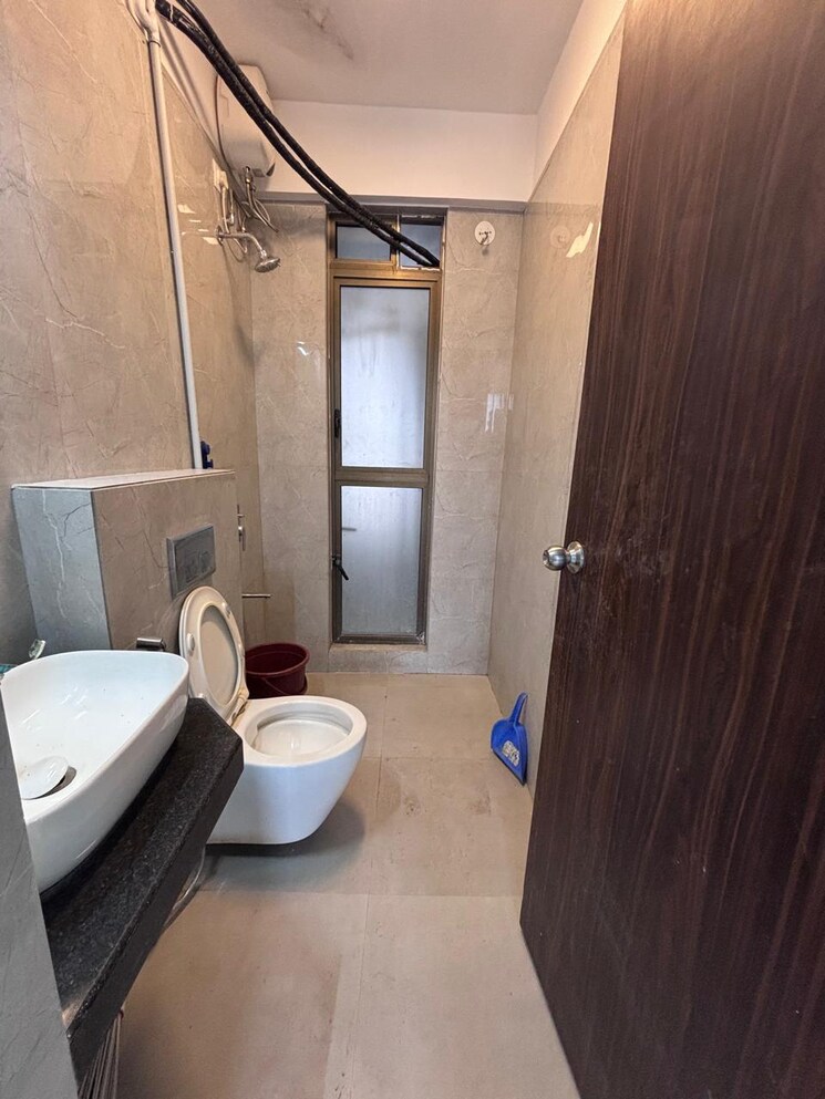 Bathroom, dosti-west-county-phase-4-dosti-pine 2 Bedroom 695 Sq.Ft. Apartment In Balkum Pada Thane 9725583