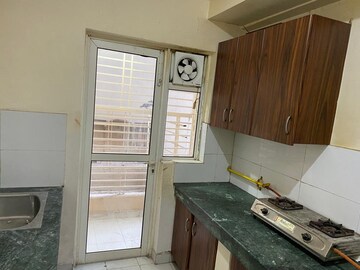 Kitchen in 3 BHK Apartment at Radhey Krishna Casa Green I, Sector 16 Greater Noida – for Sale