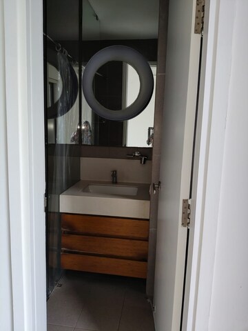 Bathroom in 3 BHK Apartment at Tata Raheja Raisina Residency, Sector 59 – for Rent