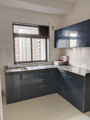 Kitchen in 2 BHK Apartment at Rustomjee Urbania Azziano, Thane West – for Rent