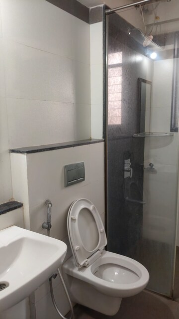 Bathroom in 1 BHK Apartment at Kalpataru Immensa, Kolshet Road – for Rent