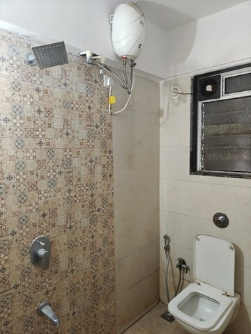 Bathroom in 2 BHK Apartment at Aakaar Tanishq Wisteria, Lower Parel – for Rent