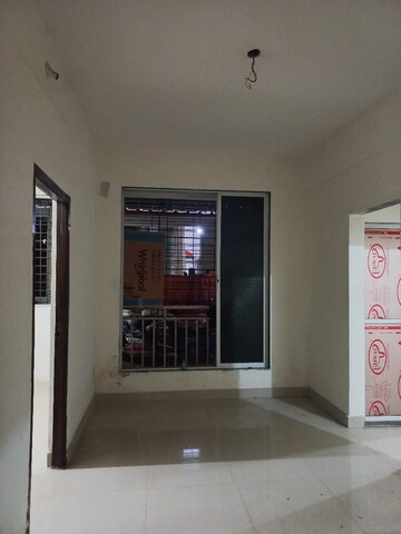Living Room in 1 BHK Apartment at Seawoods Sector 48 – for Sale