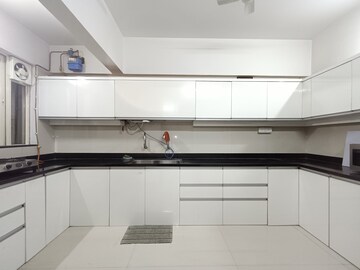Kitchen in 3 BHK Apartment at Uttam Townscapes Elite Phase III, Yerawada – for Rent