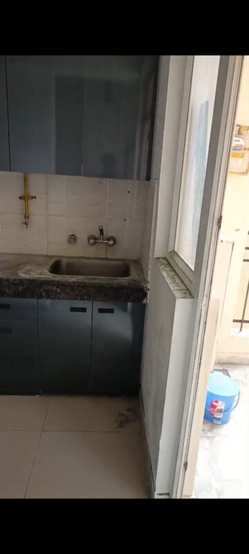 Kitchen in 2.5 BHK Apartment at Ajnara Le Garden, Sector 16b Greater Noida – for Rent