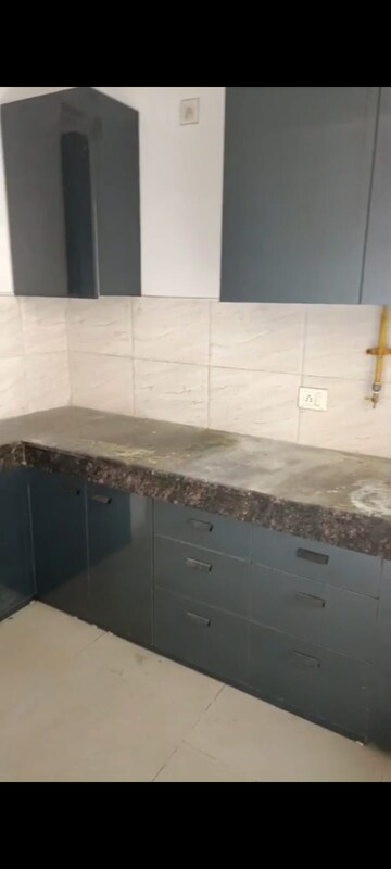 Kitchen in 2.5 BHK Apartment at Ajnara Le Garden, Sector 16b Greater Noida – for Rent