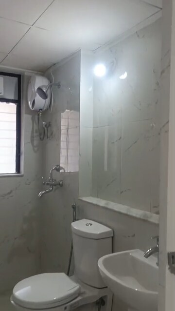 Bathroom in 2 BHK Apartment at Runwal Gardens, Dombivli East – for Sale