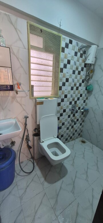 Bathroom in 2 BHK Apartment at Yash Laxman Niwas, Malad West – for Rent
