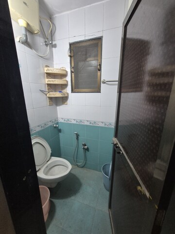 Bathroom in 2 BHK Apartment at Vasant Mandar CHS, Vasant Vihar – for Sale