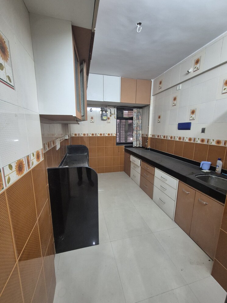 Kitchen, vasant-mandar-chs 2 Bedroom 780 Sq.Ft. Apartment In Vasant Vihar Thane 9726355