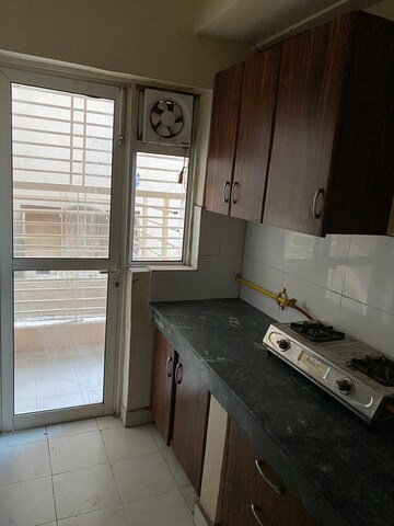 Kitchen in 2 BHK Apartment at Radhey Krishna Casa Green I, Sector 16 Greater Noida – for Sale