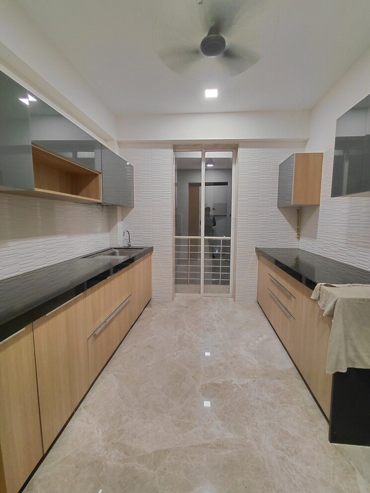 Kitchen, ekta-tripolis-phase-2 3 Bedroom 1084 Sq.Ft. Apartment In Goregaon West Mumbai 9726470