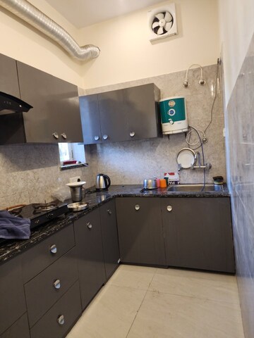 Kitchen in 1.5 BHK Apartment at JakhaN-Rajpur Road – for Rent