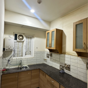 Kitchen in 2 BHK Apartment at Gaur City 7th Avenue, Sector 4 Greater Noida – for Rent