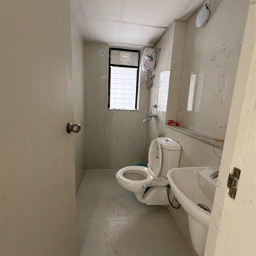 Bathroom in 1 BHK Apartment at Runwal Gardens Phase 3, Kalyan Shilphata Road – for Rent