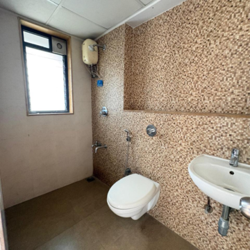 Bathroom in 2 BHK Apartment at Lodha Palava City Lakeshore Greens, Hedutane – for Rent