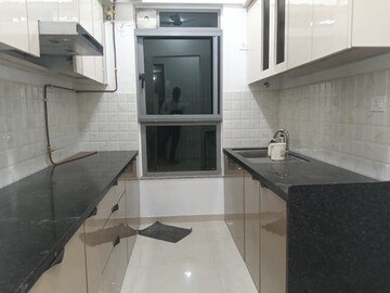 Kitchen in 2 BHK Apartment at Lodha Amara Tower 44, Kolshet Road – for Rent