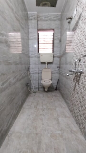 Bathroom in 2 BHK Apartment at Kopar Khairane – for Rent
