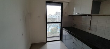 Kitchen in 1.5 BHK Apartment at Man Opus, Mira Road – for Sale