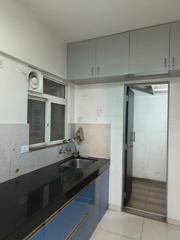 Kitchen in 2 BHK Apartment at Kolte Patil Western Avenue, Wakad – for Rent