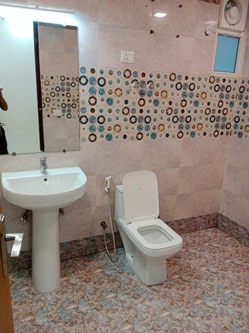 Bathroom in 4 BHK Apartment at Saya Gold Avenue, Vaibhav Khand – for Rent