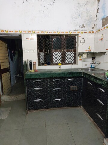 Kitchen in 1 BHK Independent House at Noble Nagar Tenament – for Rent