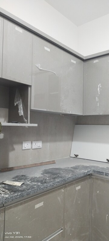 Kitchen in 3 BHK Apartment at Mahagun Mywoods, Sector 16c Greater Noida – for Rent