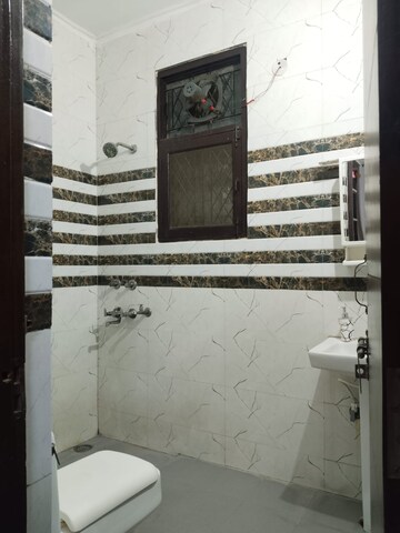 Bathroom in 3 BHK Builder Floor at Ashoka Enclave 3, Sector 35 – for Rent