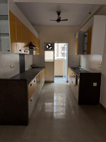 Kitchen in 3 BHK Apartment at Casa Woodstock, Sector 16c Greater Noida – for Sale