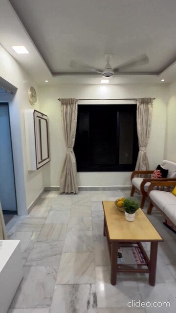 Living Room in 2 BHK Apartment at Andheri CHS, Andheri West – for Rent