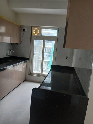 Kitchen in 2 BHK Apartment at Andheri CHS, Andheri West – for Rent