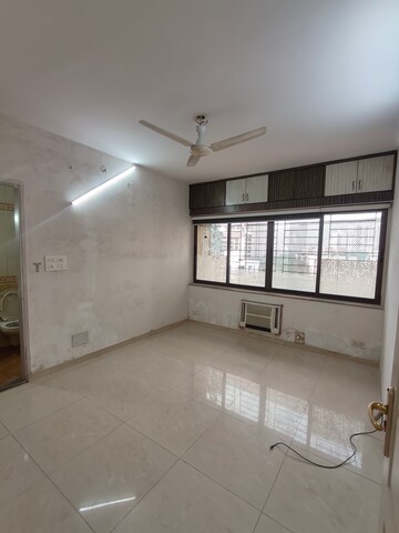 Bedroom in 3 BHK Apartment at Jasmine Tower, Vasant Vihar – for Rent