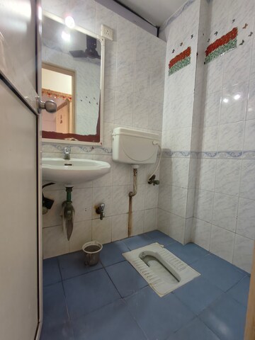 Bathroom in 3 BHK Apartment at Jasmine Tower, Vasant Vihar – for Rent