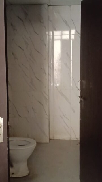 Bathroom in 1 BHK Apartment at Raj Nagar – for Sale
