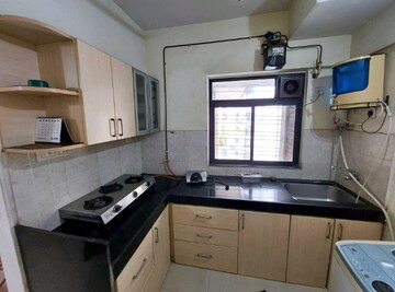 Kitchen in 2 BHK Apartment at Runwal Pearl, Manpada – for Rent