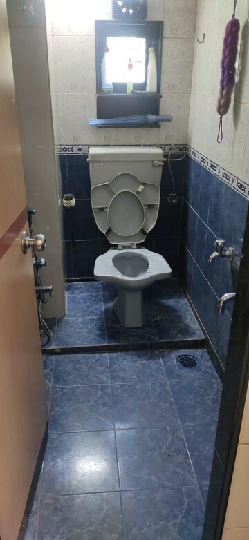 Bathroom in 1 BHK Apartment at Viman Darshan CHS, Andheri East – for Rent