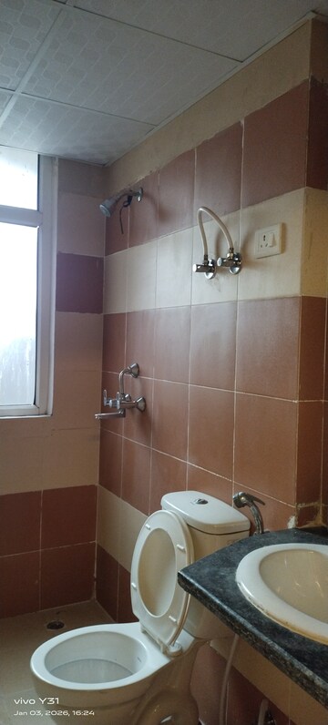 Bathroom in 2 BHK Apartment at Mahagun Mywoods, Sector 16c Greater Noida – for Rent