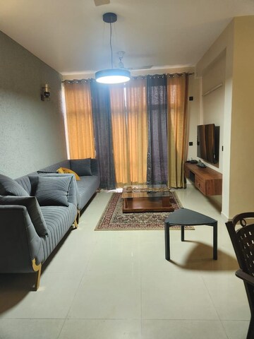 Living Room in 2 BHK Apartment at Jaypee Greens Pavilion Court, Sector 128 – for Rent